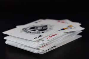 Read more about the article Unmasking the Community: Deciphering the Art of Playing with Shared Cards for Unbeatable Poker Triumphs